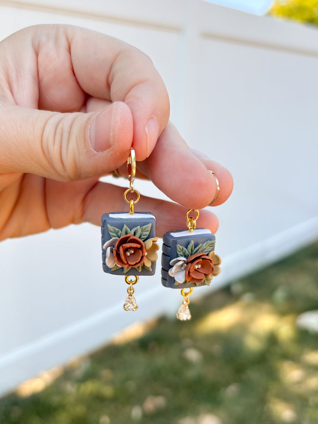 Floral book dangles